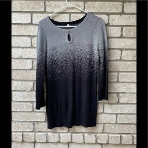 Untitled silver and black sparkly sweater.